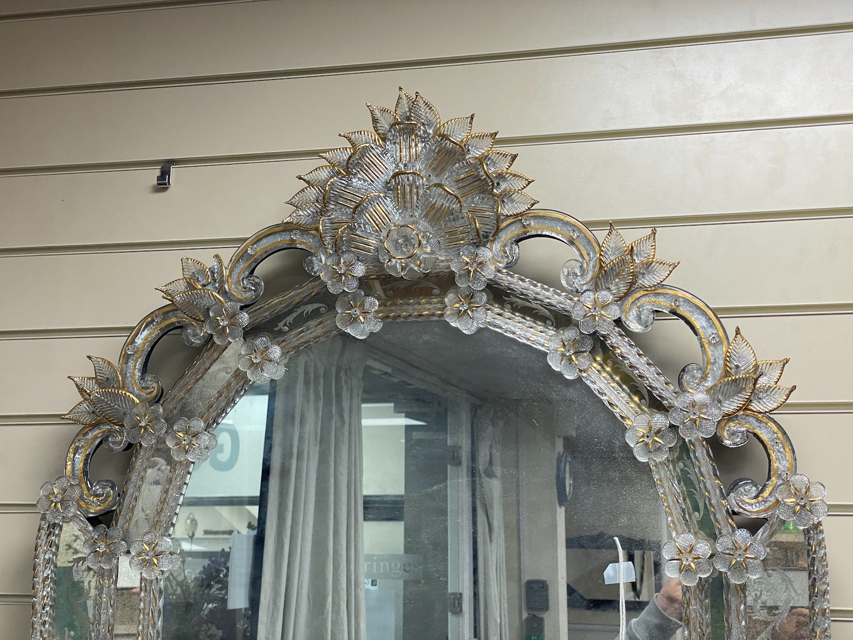 A large Venetian wall mirror with etched gilded borders, width 80cm, height 125cm